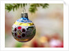 Close-up of a decorated hanging bauble against blurred background by Anonymous