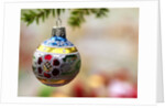 Close-up of a decorated hanging bauble against blurred background by Anonymous