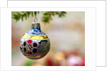Close-up of a decorated hanging bauble against blurred background by Anonymous