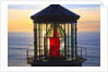 Cape Meares Lighthouse lens at sunset, from Cape Meares, Oregon, USA by Anonymous