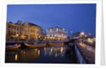 Moliceiro boats docked by Art Nouveau style buildings along the Central Canal by Anonymous