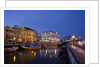 Moliceiro boats docked by Art Nouveau style buildings along the Central Canal by Anonymous