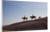 Cowgirls and dogs along the ridge of The Painted Hills by Anonymous