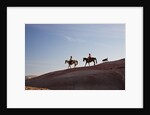 Cowgirls and dogs along the ridge of The Painted Hills by Anonymous