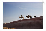 Cowgirls and dogs along the ridge of The Painted Hills by Anonymous