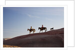 Cowgirls and dogs along the ridge of The Painted Hills by Anonymous