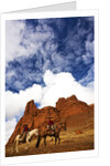 Riders passing under the Red Rock Hills of the Big Horn Mountains by Anonymous