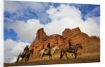 Riders passing under the Red Rock Hills of the Big Horn Mountains by Anonymous