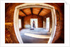Cowgirl in doorway of old cabin by Anonymous
