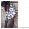 Cowgirl outside cabin by Anonymous