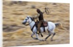 Cowboy riding the range by Anonymous