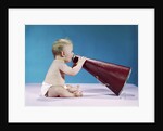 1960s Profile Of Seated Baby Shouting Yelling Speaking Into Big Megaphone by Anonymous