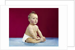 1960s Baby In Diaper Sitting Up Unsupported Red Background by Anonymous