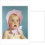 1960s Very Cute Blond Blue Eyed Baby Wearing Red White Checked Bonnet Tied In Bow At Chin by Anonymous