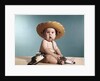 1960s Baby Wearing Cowboy Costume With Funny Facial Expression Looking At Camera by Anonymous