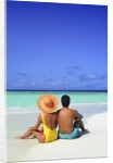 1990s Man And Woman Sitting On The Beach Facing The Water Mopion Island, Grenadines, West Indies by Anonymous