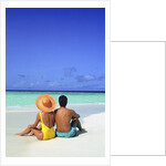 1990s Man And Woman Sitting On The Beach Facing The Water Mopion Island, Grenadines, West Indies by Anonymous