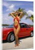 1980s Woman In Red Swimsuit In Front Of Red Sports Car by Anonymous