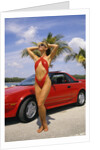 1980s Woman In Red Swimsuit In Front Of Red Sports Car by Anonymous