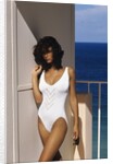 1990s Woman Wearing White Bathing Suit Looking At Camera by Anonymous