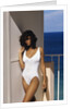 1990s Woman Wearing White Bathing Suit Looking At Camera by Anonymous
