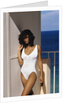 1990s Woman Wearing White Bathing Suit Looking At Camera by Anonymous