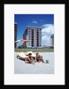 1990s Young Family On Beach Playing In The Sand by Anonymous