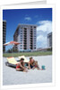 1990s Young Family On Beach Playing In The Sand by Anonymous