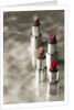 4 Lipsticks Different Colors by Anonymous