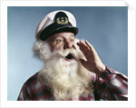 1960s Senior Man Full White Beard Wear Ship Captains Hat Shouting With Hand Cupped To Mouth by Anonymous