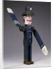 A polychrome wood and metal whirligig modelled as a police sergeant by Anonymous