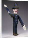 A polychrome wood and metal whirligig modelled as a police sergeant by Anonymous