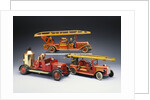 A Tipp and Company tinplate keywind overhead ladder fire engine with a Bing heavy tinplate fire pumper and a Gunthermann tinplate windup fire ladder truck by Anonymous