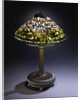Tiffany Studios 'Cyclamen' leaded glass and bronze table lamp by Anonymous