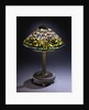 Tiffany Studios 'Cyclamen' leaded glass and bronze table lamp by Anonymous