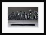 A Haida argillite ship pipe depicting a ship, an equestrian scene and various scroll and foliate motifs by Anonymous