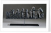 A Haida argillite ship pipe depicting a ship, an equestrian scene and various scroll and foliate motifs by Anonymous