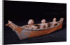 A Makah hunting canoe model by Anonymous