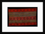 A transitional Navajo woman's blanket by Corbis