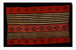 A transitional Navajo woman's blanket by Corbis