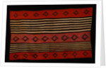 A transitional Navajo woman's blanket by Corbis