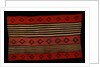 A transitional Navajo woman's blanket by Corbis