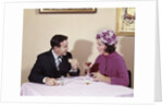 1960s Couple Drinking Cocktails At Table Husband Wife Indoor by Anonymous