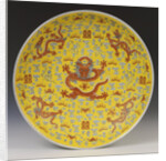 A large iron-red yellow ground dragon dish, the centre of the interior depicting a large full-faced dragon and flaming pearl by Anonymous
