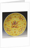 A large iron-red yellow ground dragon dish, the centre of the interior depicting a large full-faced dragon and flaming pearl by Anonymous
