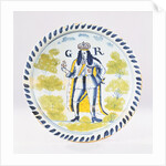 A Bristol Delft polychrome royal portrait charger painted with a full length portrait of George I in formal robes by Anonymous