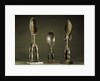 Three Dan spoons with elogated legs by Anonymous
