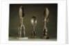 Three Dan spoons with elogated legs by Anonymous