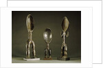 Three Dan spoons with elogated legs by Anonymous
