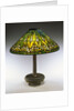 Tiffany Studios 'Arrowroot' leaded glass and bronze table lamp by Anonymous